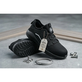Men’s black lightweight safety work sneakers with mesh upper, rubber outsole, and reinforced toe cap for protection
