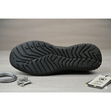Men’s black lightweight safety work sneakers featuring a black rubber sole with textured wavy tread and size 42 embossed near heel