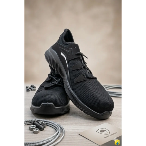 Men’s black lightweight safety work sneakers with mesh upper, reinforced toe cap, and white accent stripe