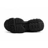 Black rubber sole of red air cushion lightweight protective work cushion safety sneakers with textured tread design